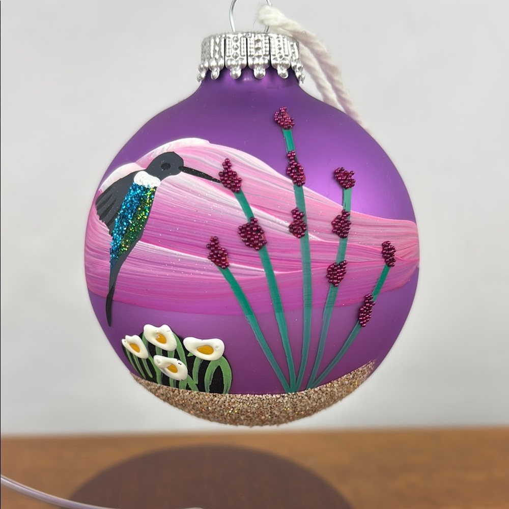 Hand painted hummingbird ornament by artist Brenda J. Schodt